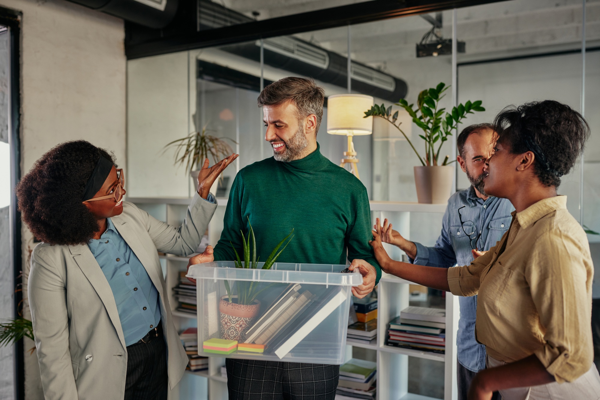 Businesspeople greets male worker who return to work